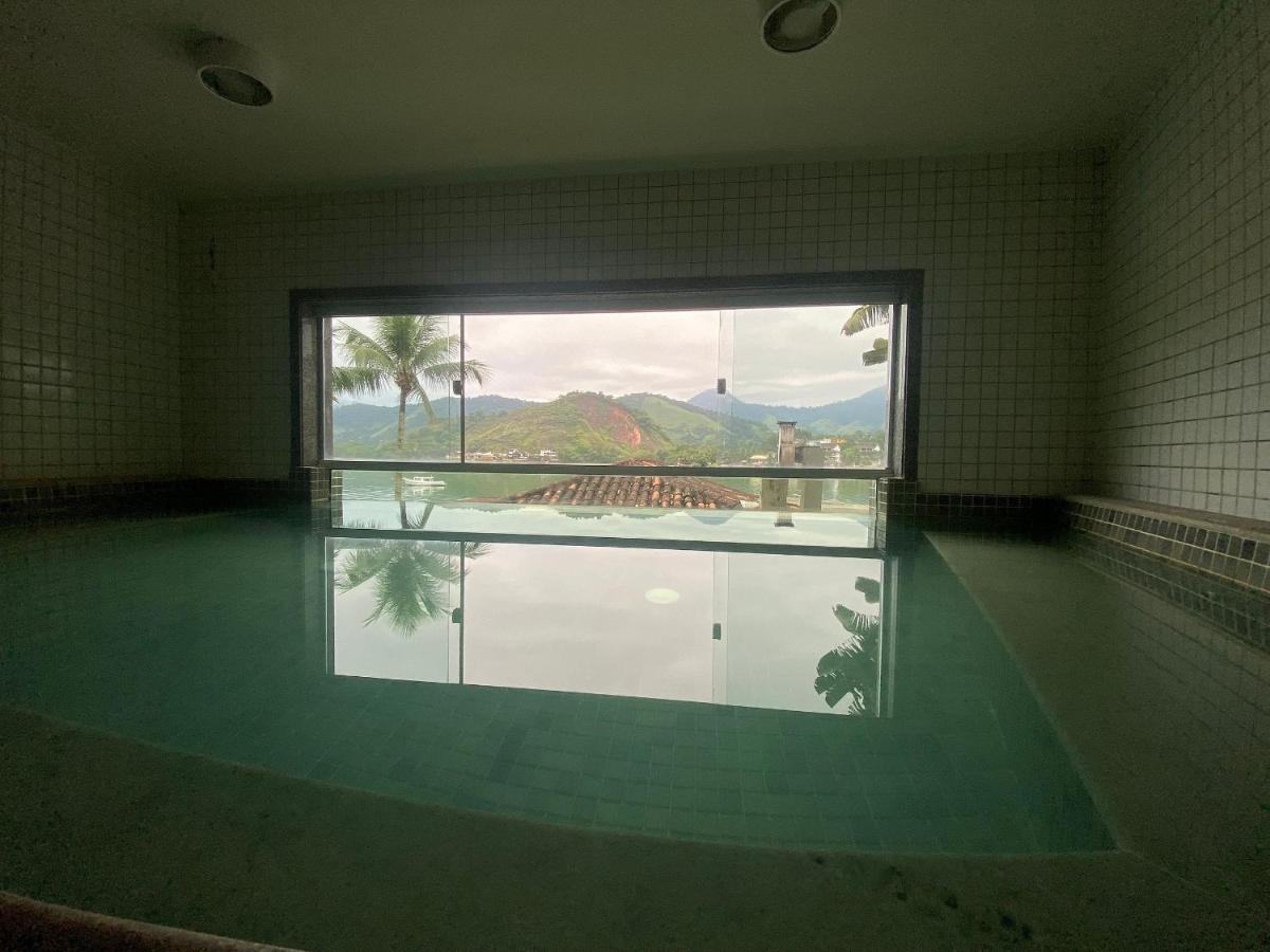Condomínio com piscina, churrasqueira, sauna e MARINA P LANCHA - WiFi 200Mbps - 1qt e sala com 2 ar condicionados Angra dos Reis Exterior foto